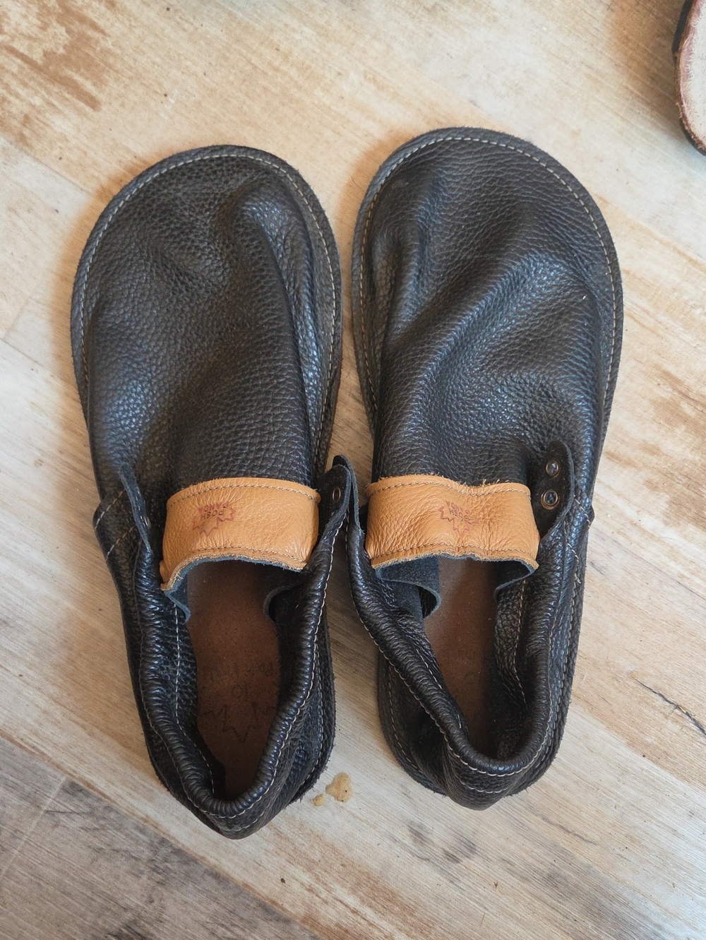 Posh Panda Casual Leather Slip-On Shoes in Black with Tan Accent
